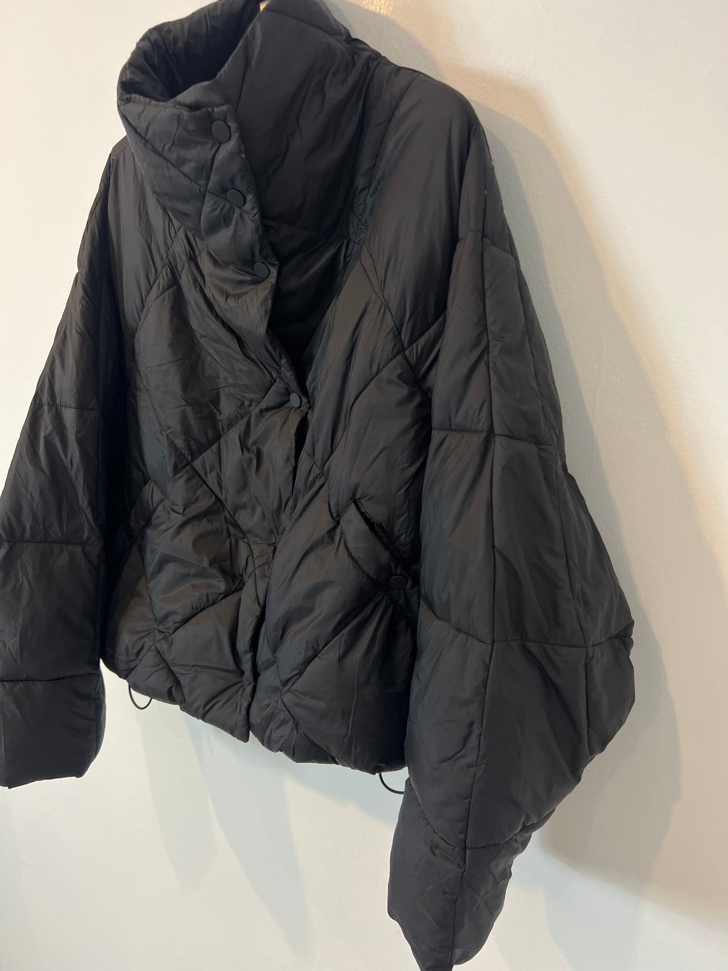 ZARA. plumas negro guateado T.m