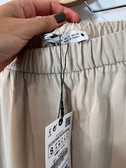 ZARA. Flowy beige wide-legged trousers. TS