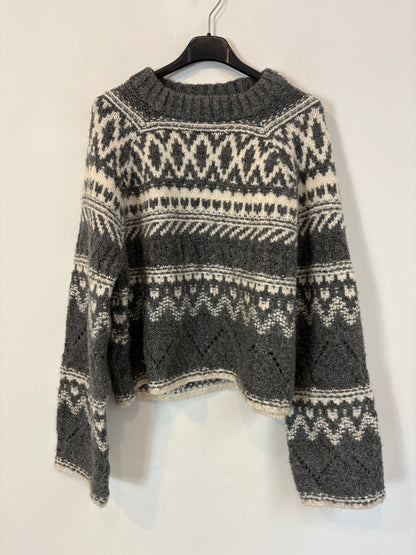 H&M. Jersey gris greca