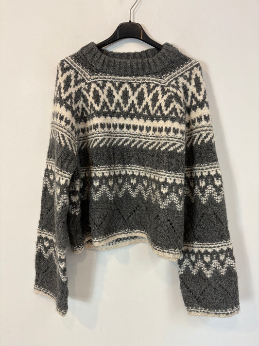 H&M. Jersey gris greca