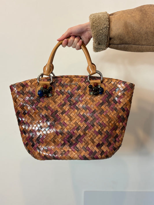 MIU MIU. Bolso trenzado piel