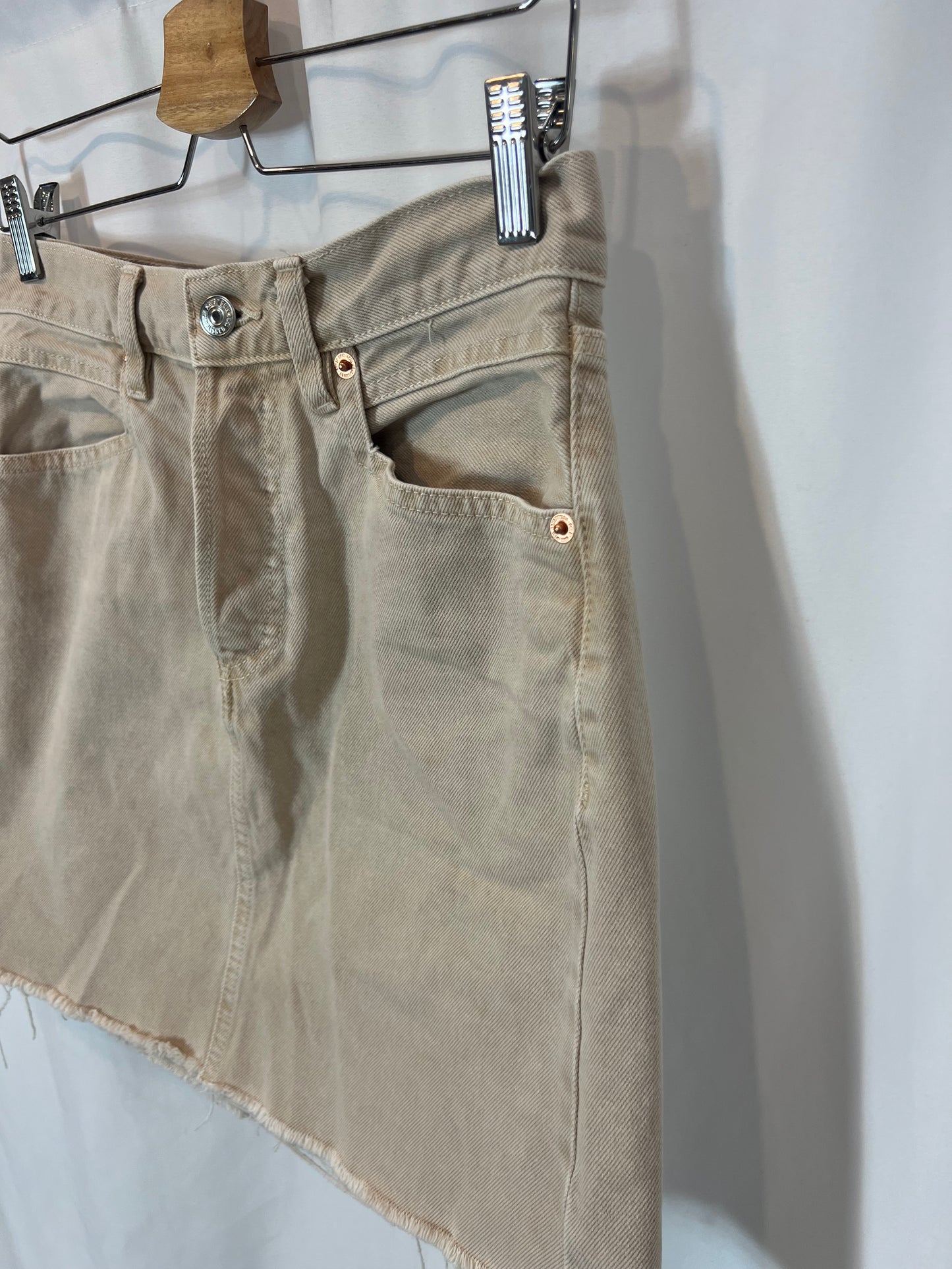 MANGO. Short beige buttoned denim skirt. TM