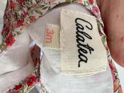 CALATEA. Flower-necked romper, 3 months old