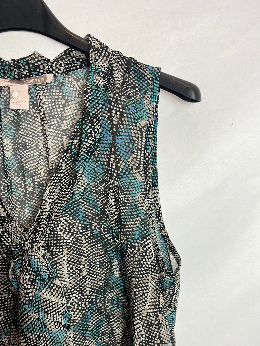 FOREVER 21. Top estampado semitransparente . T S