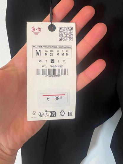 ZARA. Pantalón negro costura detalle cremalleras. T M