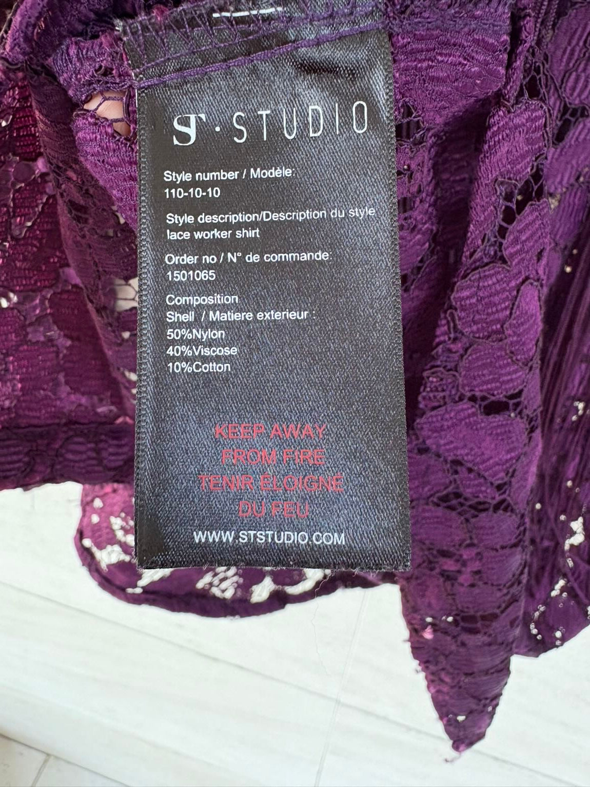 ST STUDIO. Camisa encaje detalle flecos