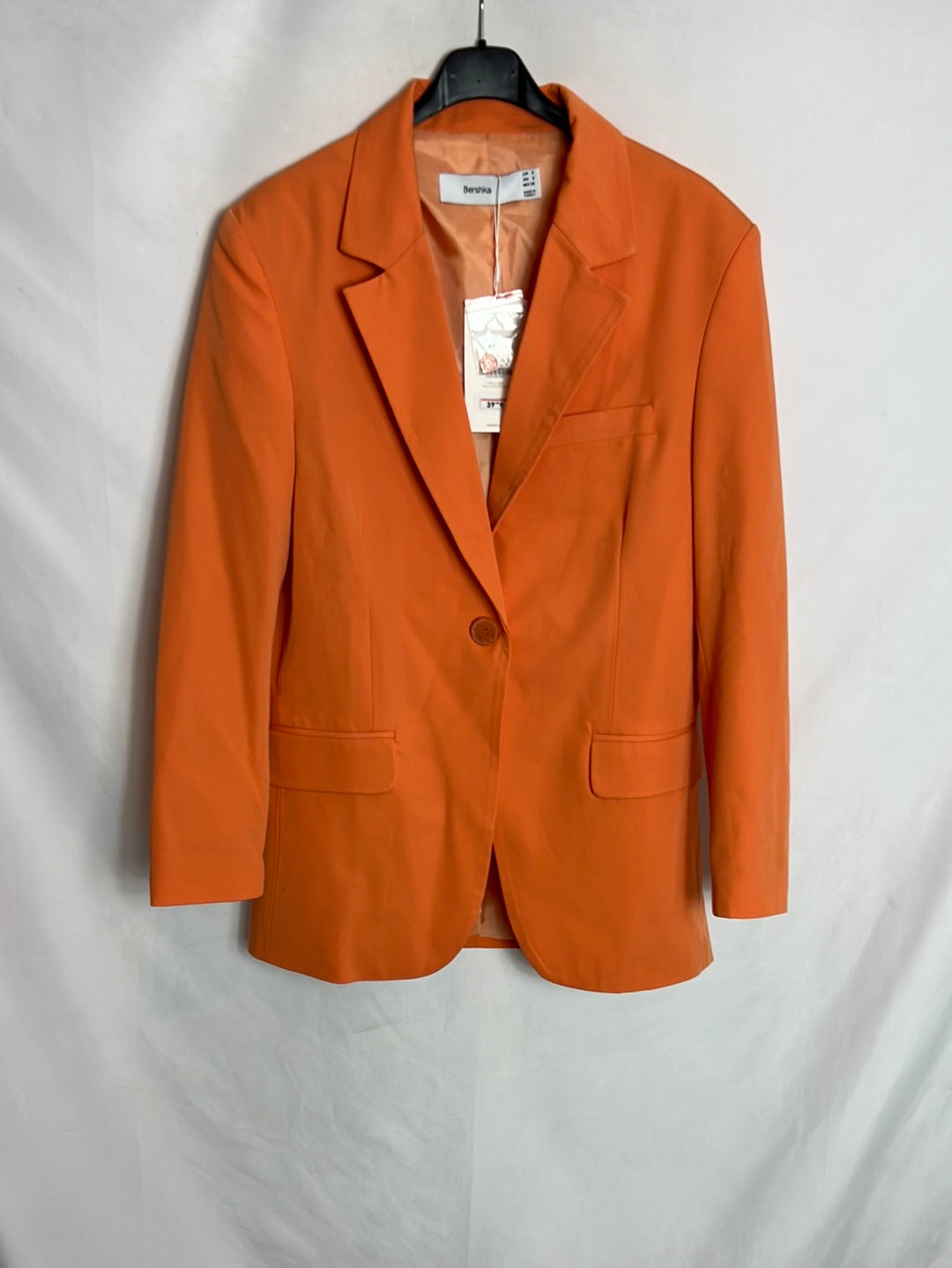 BERSHKA. Total look naranja T.s