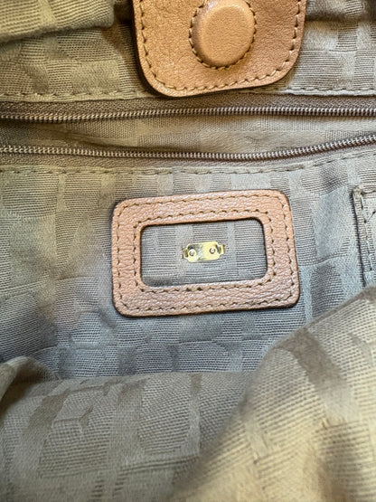 FURLA. Bolso de hombro piel trenzada