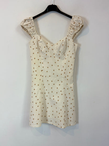 LPA. Vestido corto entallado lunares