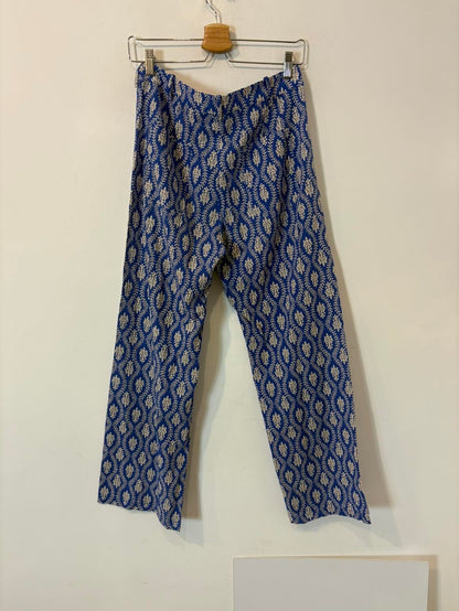 ZARA. Pantalón azul fluido abotonado