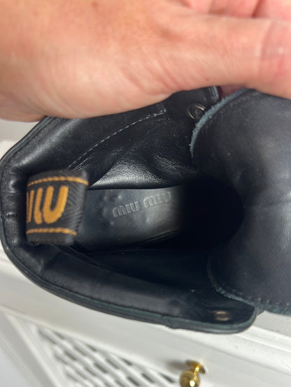 MIU MIU. Black lace-up heeled ankle boots. Size 39