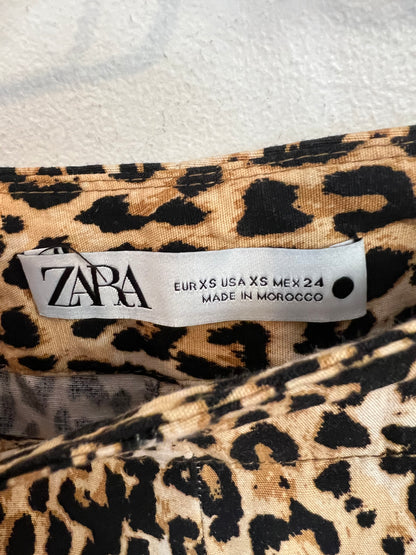 ZARA. Flared animal print trousers T.xs
