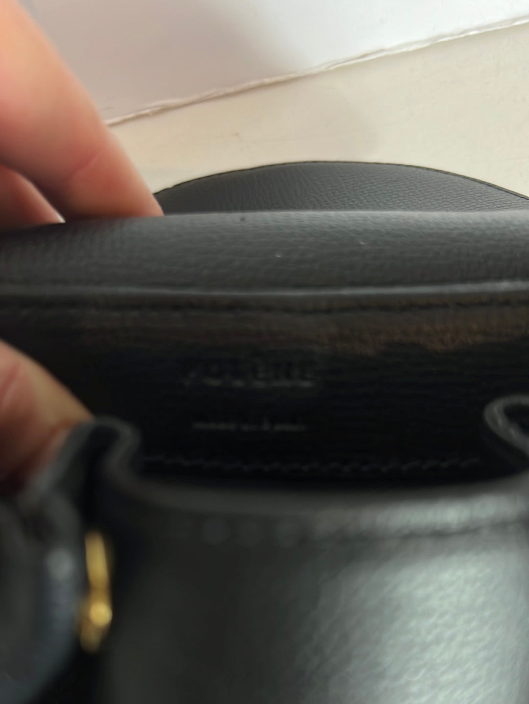 POLLENE. Black mini bag with long handle