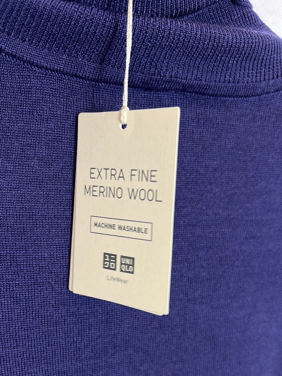 UNIQLO. Jersey morado/azul lana cuello alto. T M