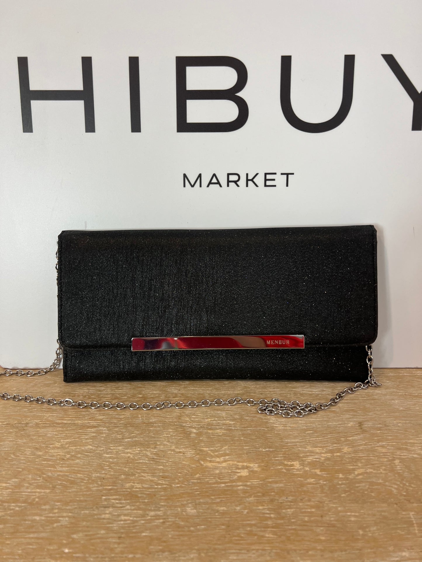 NEMBUR. Bolso de mano negro purpurina