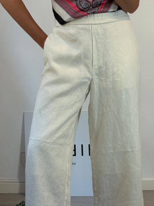 COS. Pantalón color crudo fluido 38