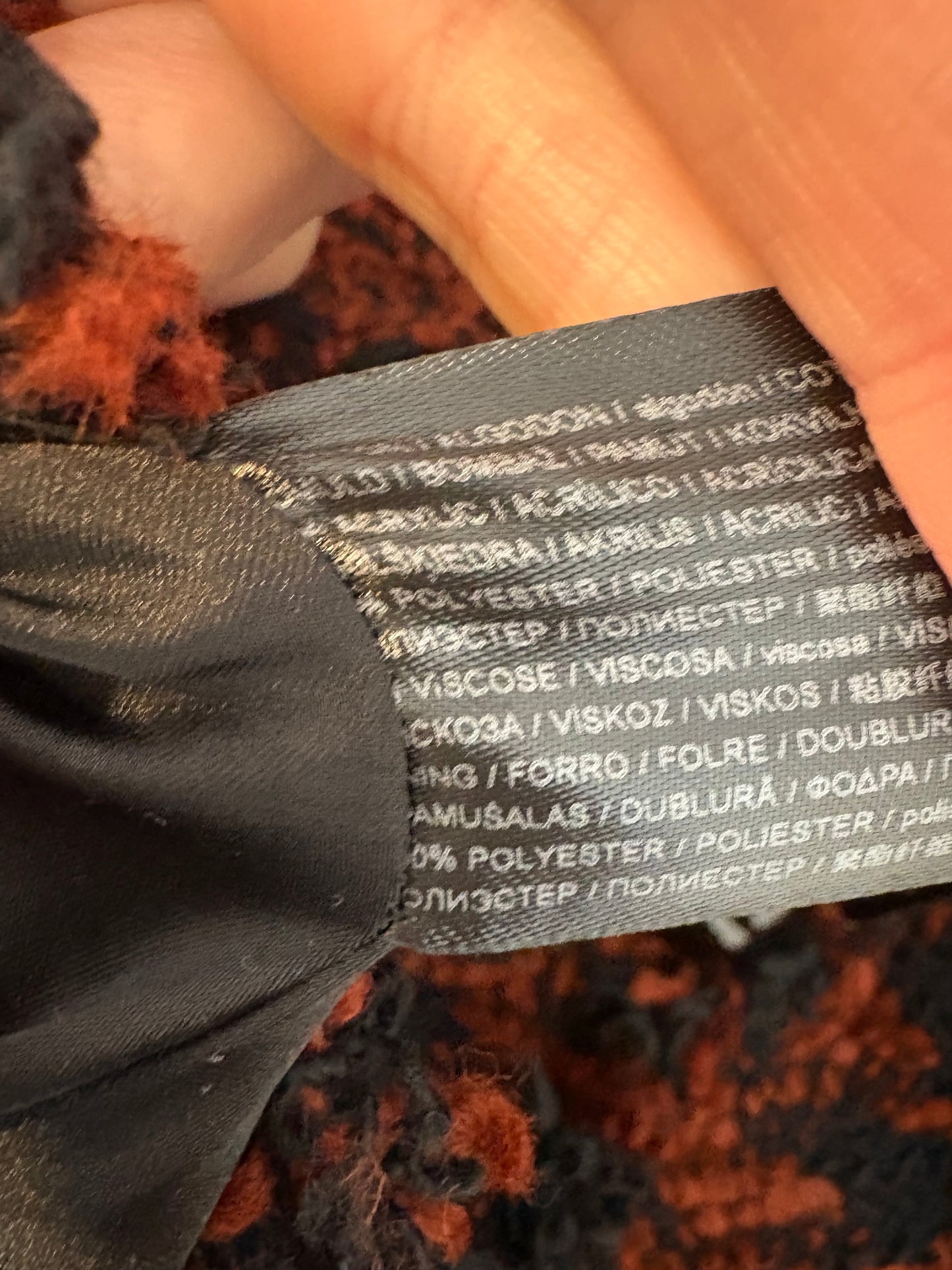 MANGO. Chaqueta tweed detalle botones