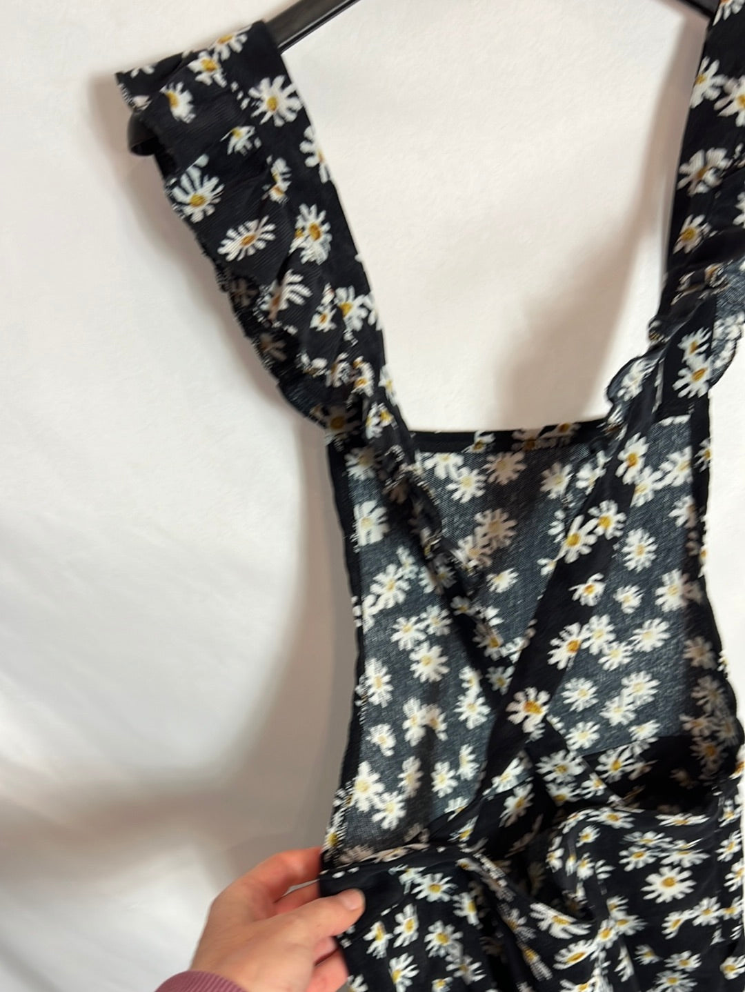 OTRAS. Mono negro micro pana y margaritas. T M