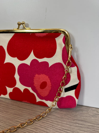 OTRAS. Bolso mini flores rosas