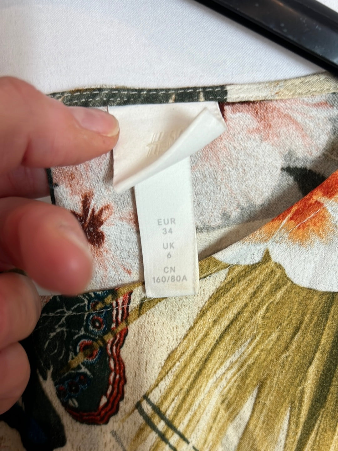 H&M. Vestido corto estampado hojas. T XS