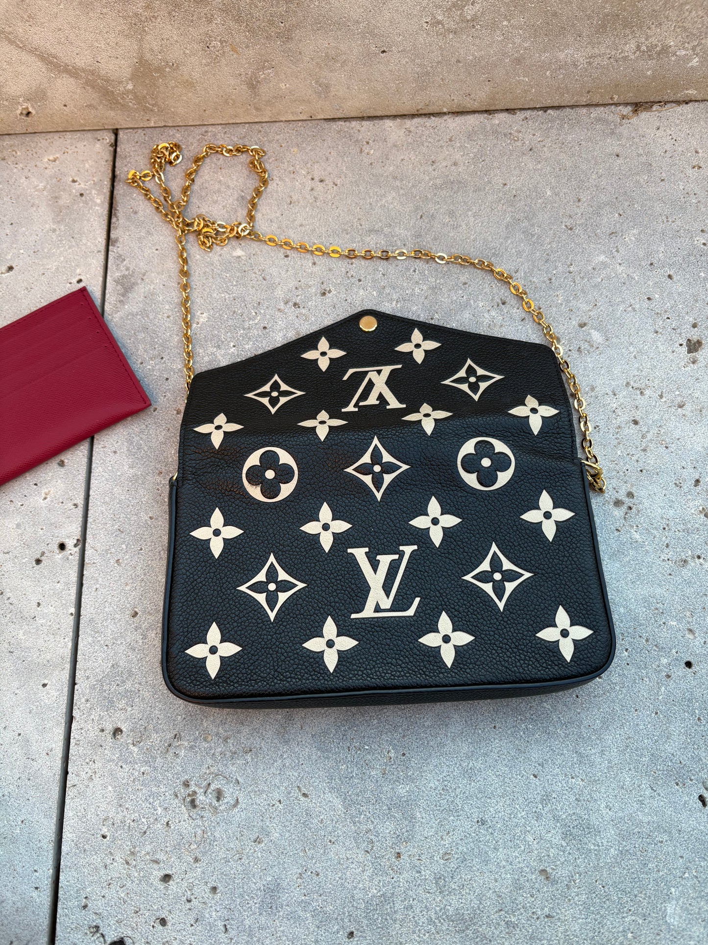 LOUIS VUITTON. Cartera de mano Félicie