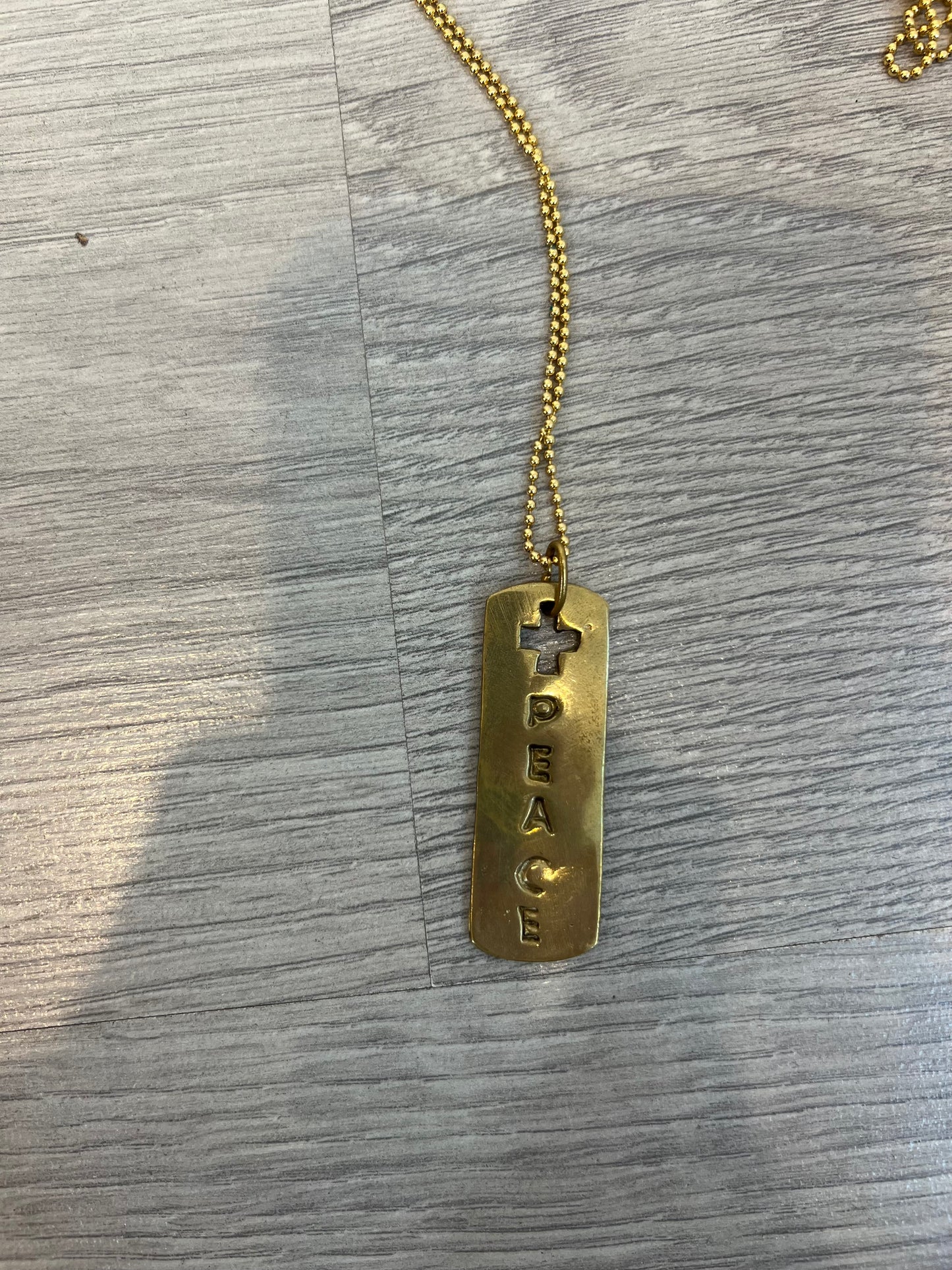 OTRAS. Colgante "peace"