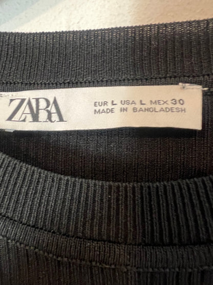 ZARA. Top negro canalé fluido. T L
