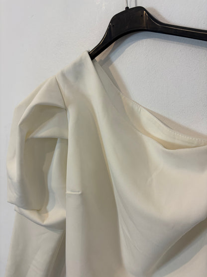 OTHERS. White asymmetrical top with puffed sleeves. TM