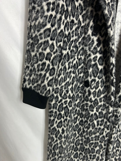 BIMBA Y LOLA. Abrigo textura animal print. TS