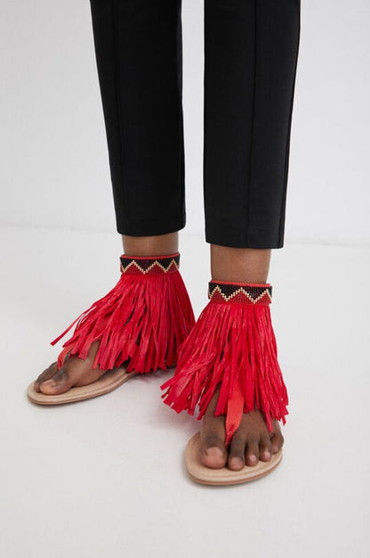 DESIGUAL X STELLA JEAN. Sandalia roja flecos T.36