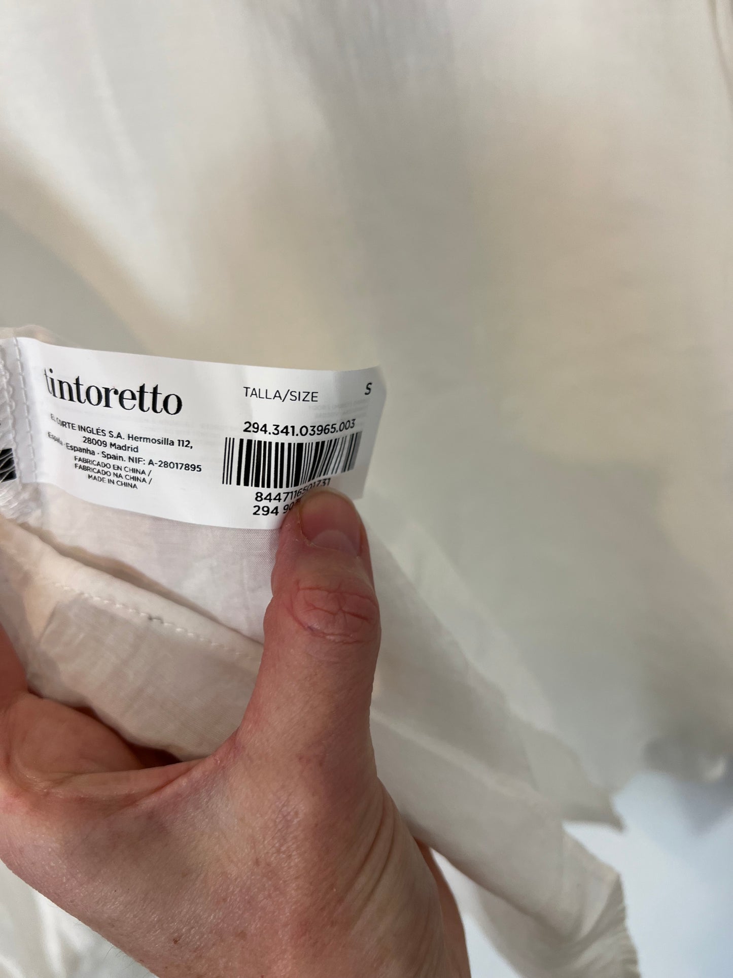 TINTORETTO. Blusa blanca botones joya