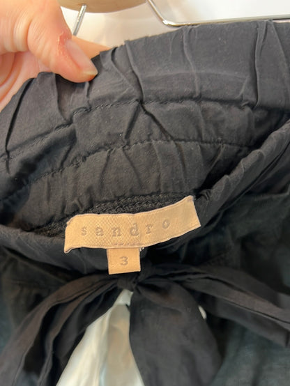 SANDRO. Short black skirt with bow detail. Size 3 (M/L)
