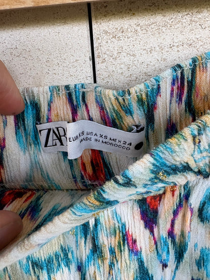 ZARA. Pantalón fluido estampado hilos. T XS