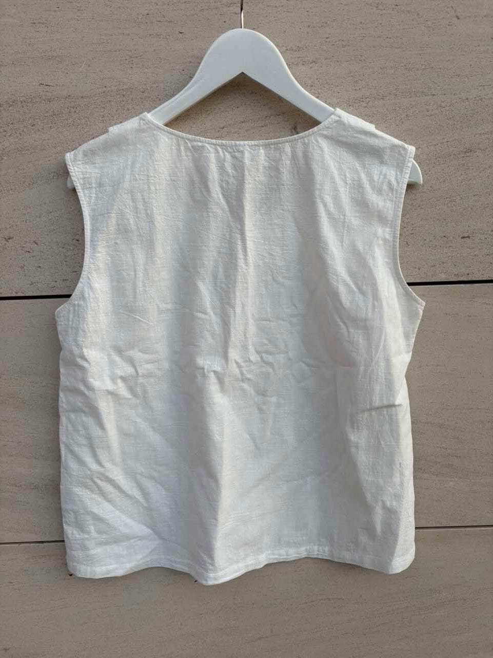 Top algodón detalle cuello