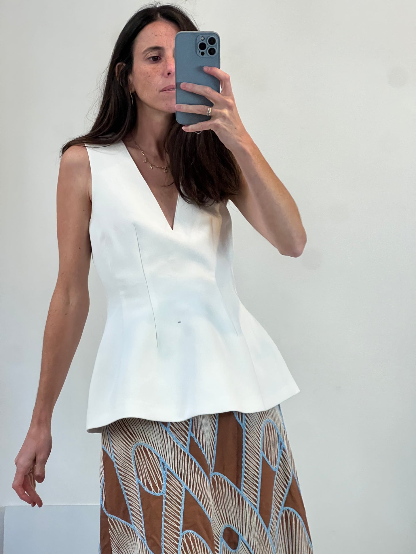 ZARA. Top blanco detalle volante