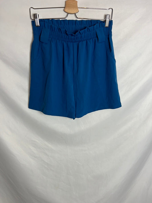 OTRAS. Bermudas azules bolsillos. T L