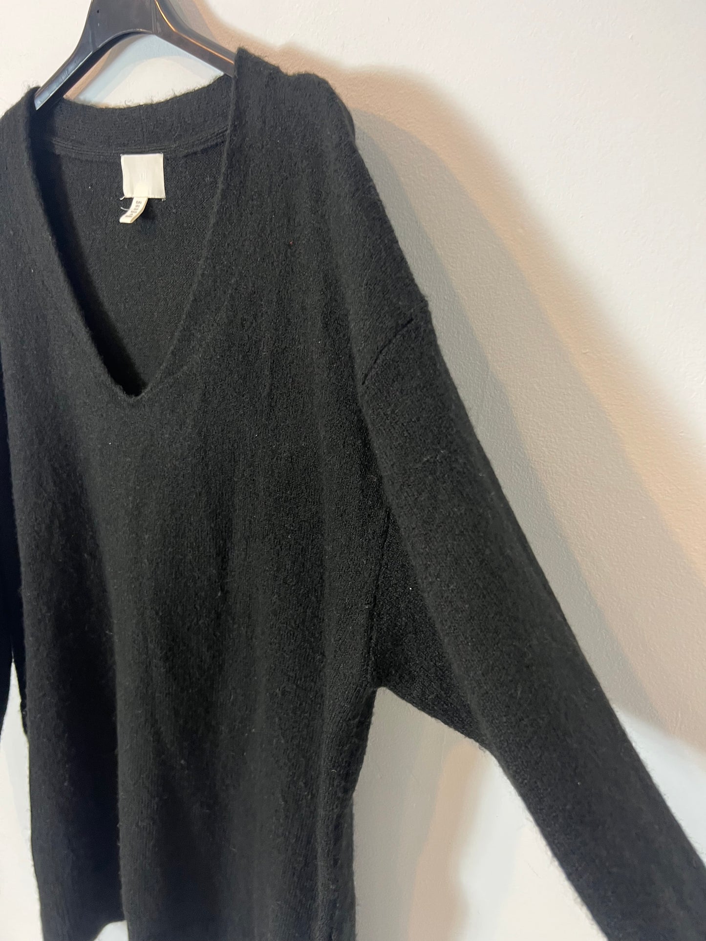 H&M. Jersey negro largo. T S