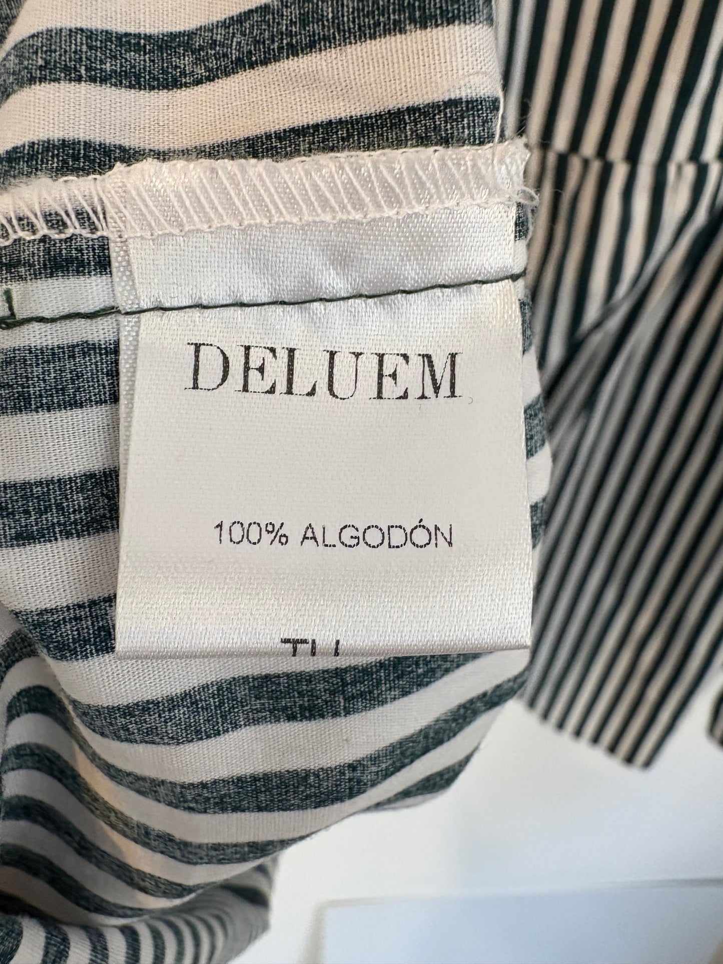 DELUEM. Blusa rayas nido de abeja