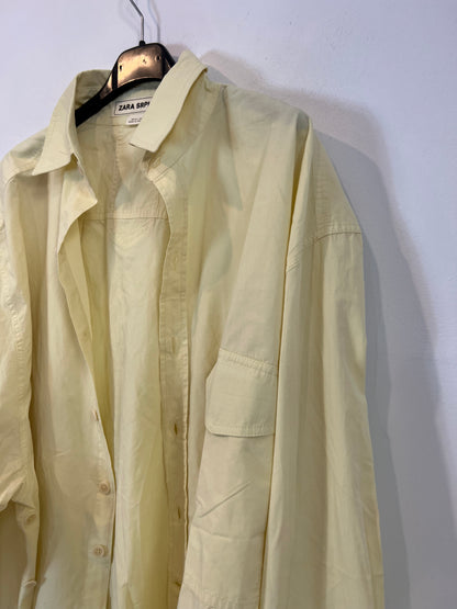 ZARA. Blusa amarilla amplia T.xs/s