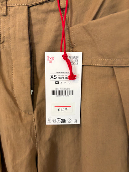 ZARA SRPLS. Pantalón marrón bolsillos efecto falda