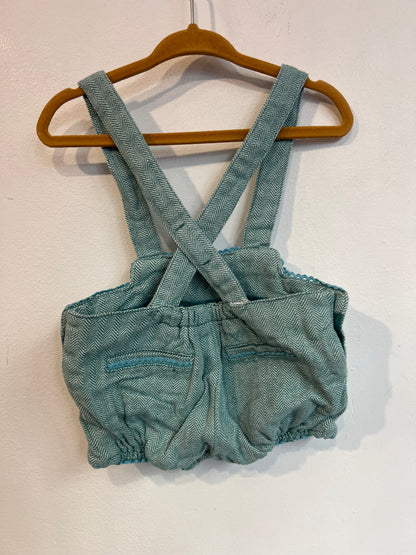 PATRICIA MENDILUCE. Ranita algodón azul claro jaspeado. T 12-18 meses