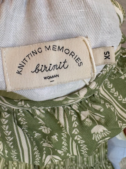 BIRINIT. Vestido largo asimétrico estampado