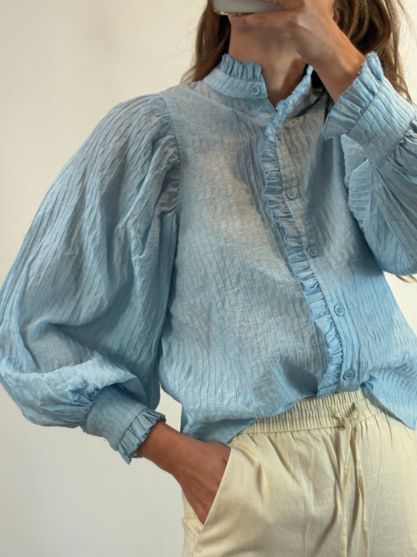 Blusa azul claro textura