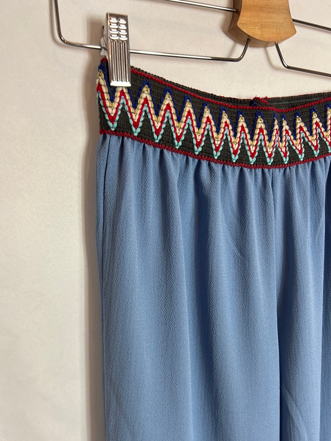 TEEN BY AGATAS. Flowy blue trousers with waist detail. Size 12 years.