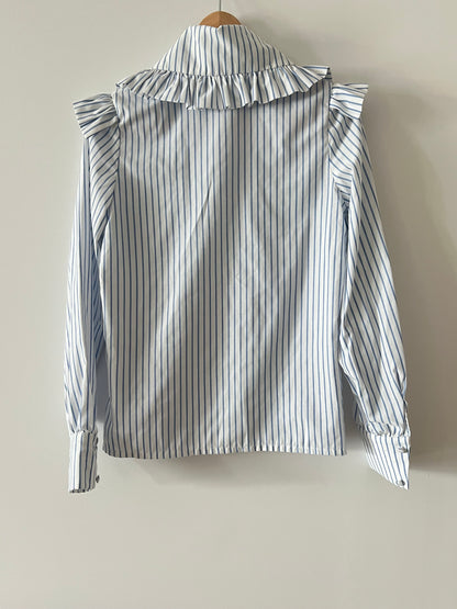 VOGANA. Blusa rayas cuello