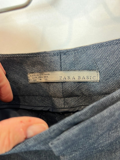 ZARA. Pantalón azul ancho T.40