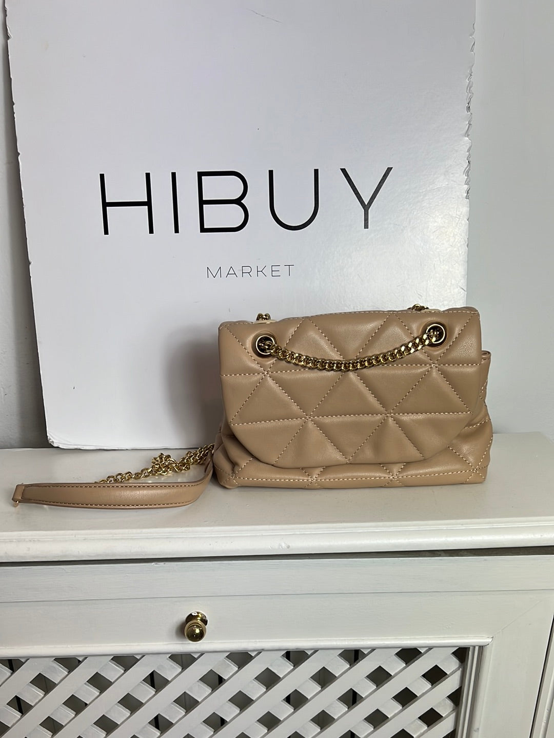 OTRAS. Bolso beige guateado