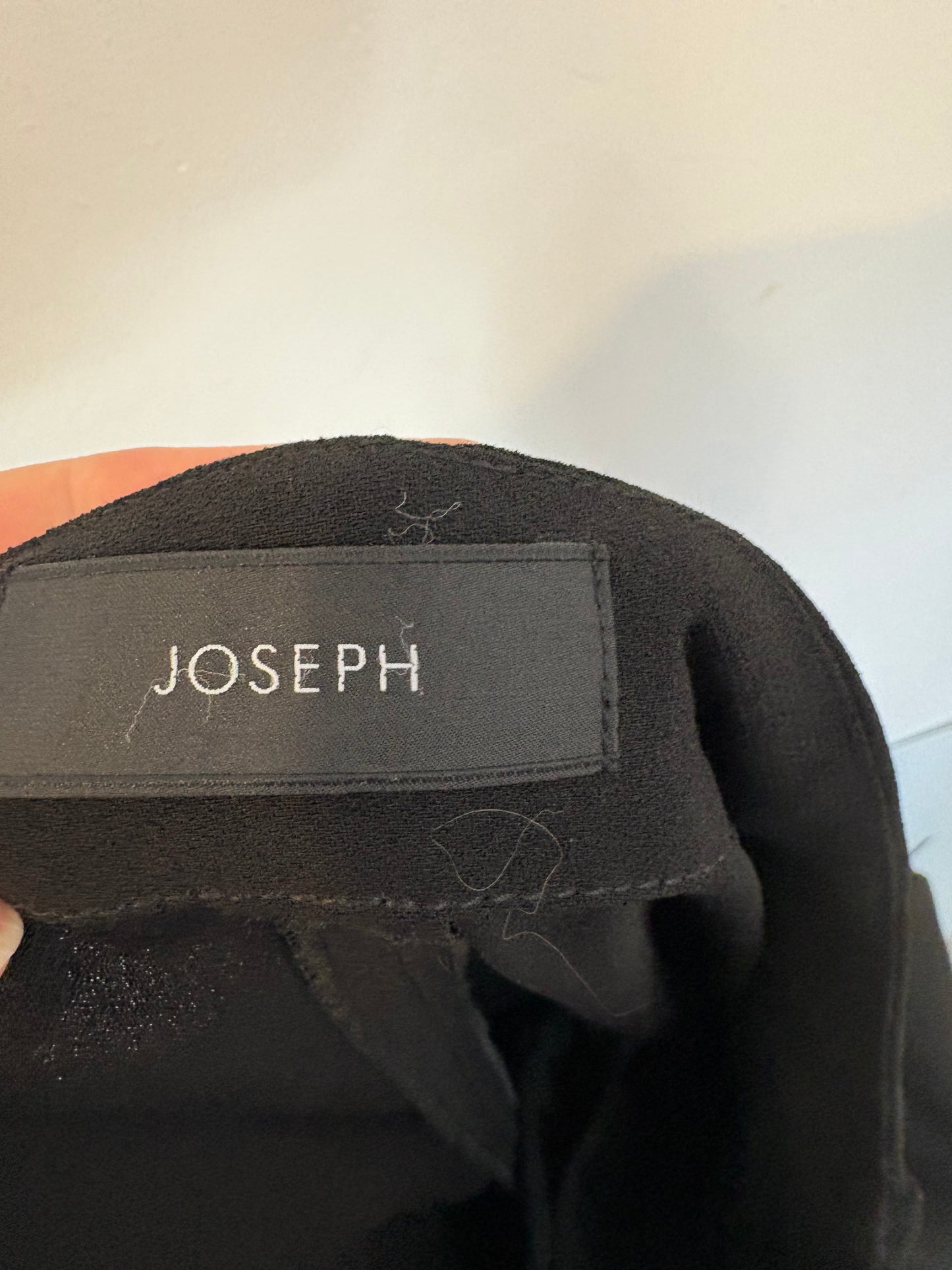 JOSEPH. Pantalón negro fluido detalles en piel