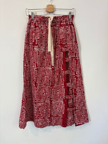 KIMALÉ. Conjunto falda y camisa roja estampada. T 36