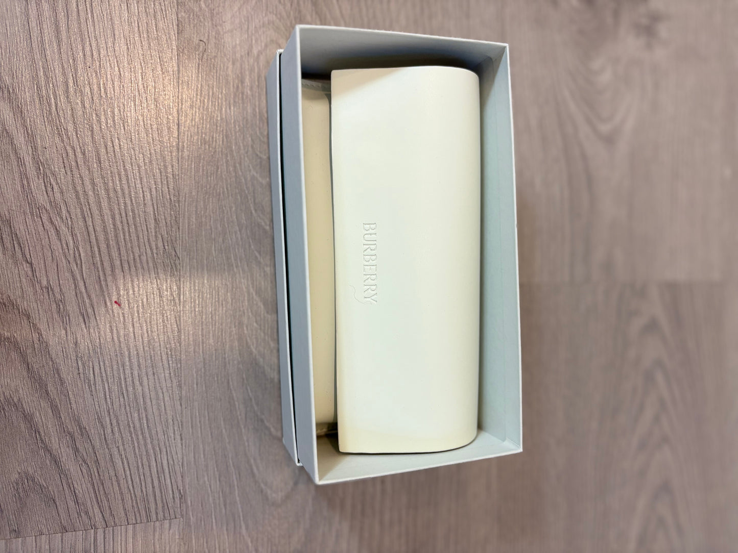 BURBERRY. Green-framed sunglasses